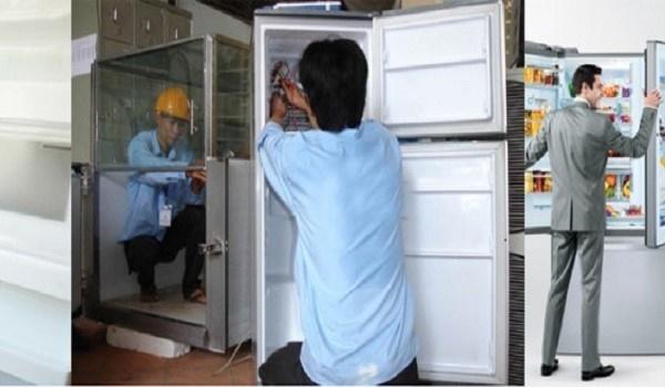 A person standing in front of a refrigerator Description automatically generated